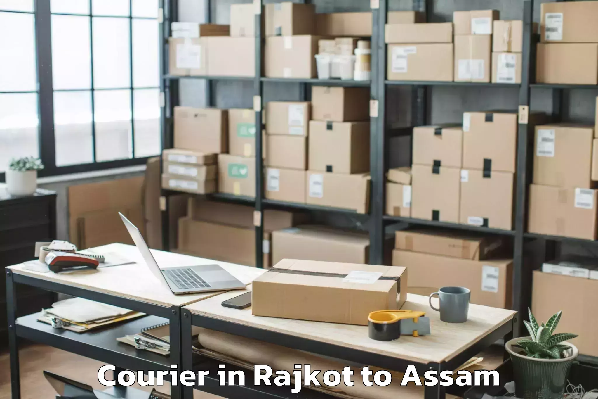 Book Rajkot to Rangia Courier Online